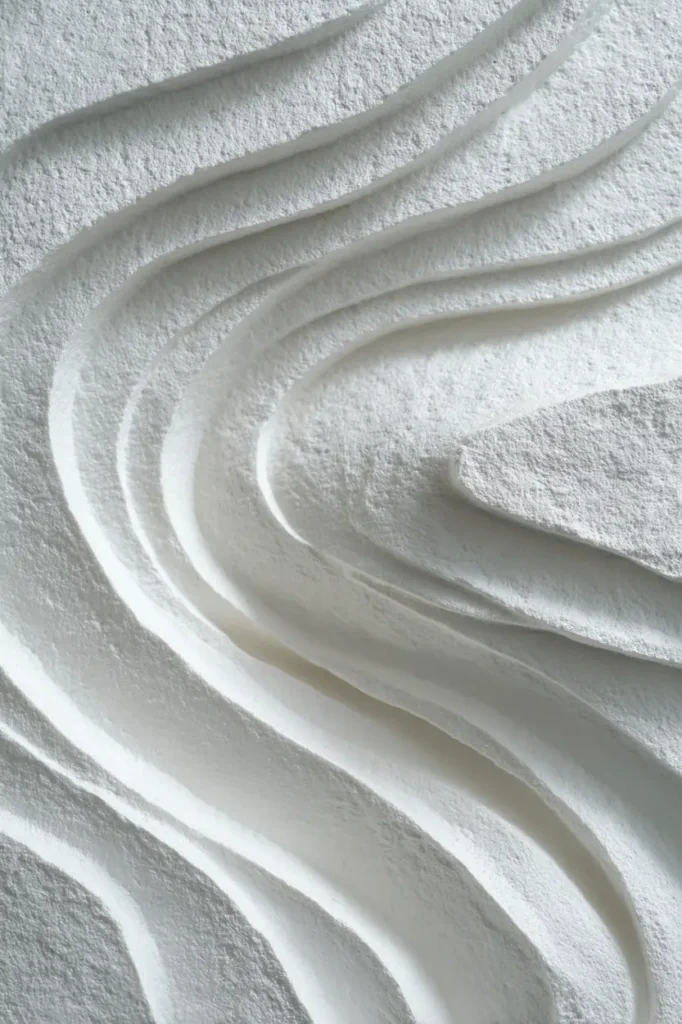 Abstract white wave wall art subtly evoking ocean movement without literal imagery.
