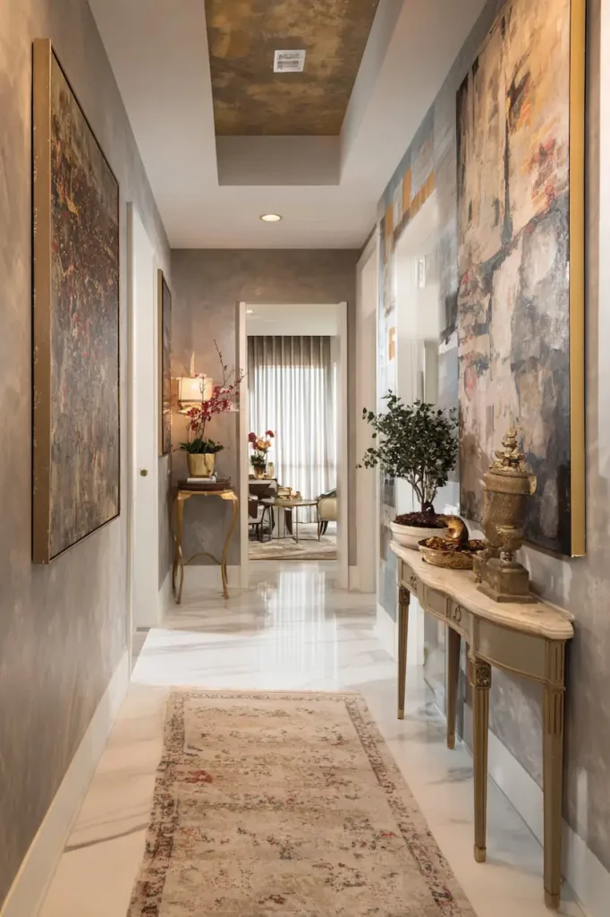 A narrow wall enhanced by vertical wall art that emphasizes height and elegance.