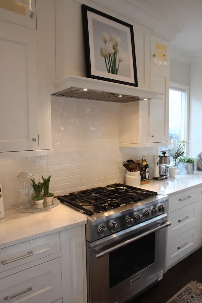 Print protected by glass as kitchen wall decor above stove.
